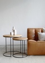leather padded sofa and noa nesting side table.jpg